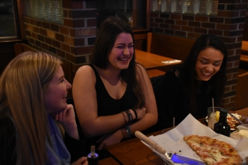 From left, Paige Yacobian, Sophia Romano and Sandra Durbin are celebrating a friends birthday at Faccia Luna, an Italian restaurant in State College, PA on February 2, 2016.